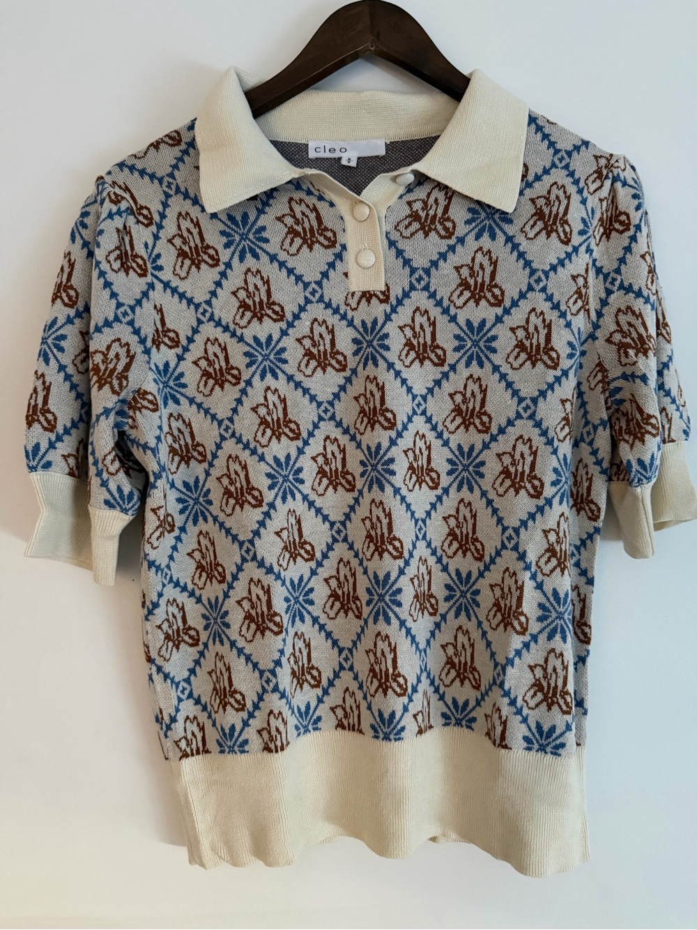 cleo Cream Knit Short Sleeve Polo with Blue and Brown Motif